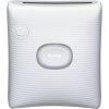 White Instax portable photo printer with a ribbed, wavy surface and a centered oval 'instax' button.