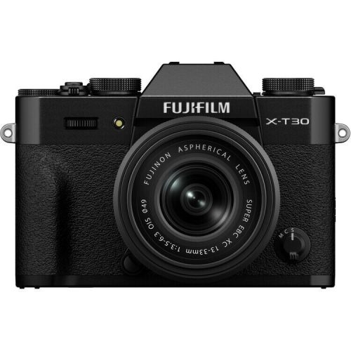 Fujifilm X-T30 mirrorless camera with a zoom lens attached, facing forward.