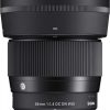 Sigma 56mm f/1.4 DC DN camera lens in black with knurled focus ring and metal mount (front view).