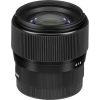 Black camera lens with a wide, knurled focus ring and glass element at the front; '18' marked on the barrel.
