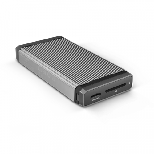 Portable external hard drive with two SD card slots (microSD and SD) on the front panel, aluminum body with cooling fins, angled view