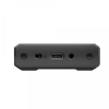 Bottom view of a rugged black device showing a USB-C port, a small switch, a circular jack, and screws along the edge