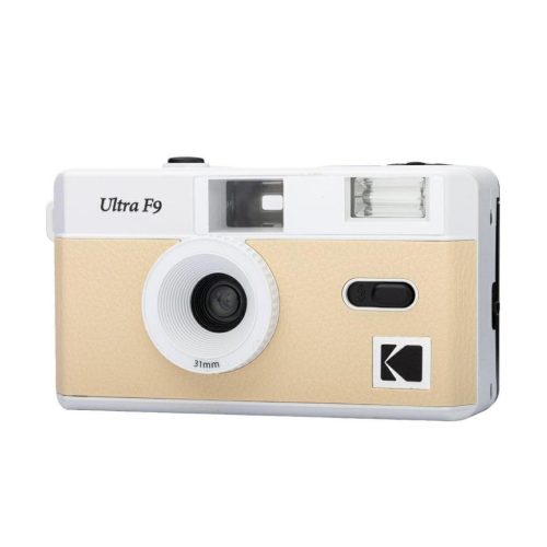Front view of a white and beige compact film camera labeled Ultra F9 with a 31mm lens and built-in flash window above the lens.