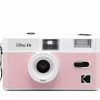 Pink Kodak Ultra F9 compact camera with white top, central lens, and strap on the side.