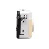 Side view of a compact retro-style camera with a white body, beige grip, black accents, and a small wrist strap