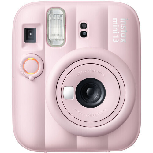 Pink Fujifilm Instax Mini 13 instant camera with lens, flash, and built-in grip in soft pastel pink.