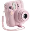 Pink Instax Mini 9 instant camera with wrist strap and extended lens, shown from a slight angle on a white background.