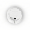 Bottom view of a white Sonos Era 100 SL speaker, showing the power input and circular mounting area with feet around the edge.