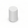 White Sonos wireless speaker, cylindrical with a perforated fabric grille and a smooth white top edge.