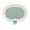 Rear view of a white Sonos Play wireless speaker with a mint-green back panel and hanging strap.
