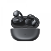 Dark wireless earbuds in an open charging case, shown from the front.