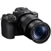 Sony RX10 digital camera with a large attached zoom lens (Vario-Sonnar T*), shown in a three-quarter view from the left side.