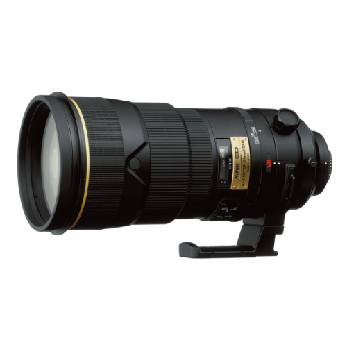 Nikon telephoto zoom lens with gold accent and tripod collar on a white background