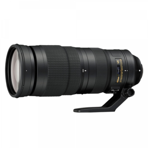Nikon telephoto zoom lens with attached tripod foot and VR label visible on black body
