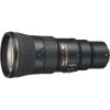 Nikon telephoto zoom lens shown in side profile with focus and zoom rings visible