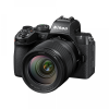 Nikon Z-series mirrorless camera with a zoom lens attached (NIKKOR) set on a white background.