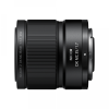 Side view of Nikon NIKKOR Z DX MC 35mm f/1.7 lens, with a textured focus/zoom ring and metal mount visible at the rear.