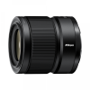 Nikon camera lens shown in profile with textured grip and brand visible on the barrel.