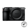 Front view of a black Nikon Z-mount mirrorless camera body with a lens cap on and textured grip.