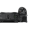Top view of a black DSLR camera showing the mode dial, shutter button, and control dials on the grip side.