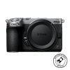 Nikon Z mount mirrorless camera body with textured grip and control dials, front view. Action-ready product photo.