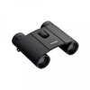 Black Nikon binoculars photographed from an angled side view on a white background, showing the textured grip and eyepieces.
