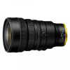 Nikon NIKKOR 28-135mm power-zoom lens shown in side view with a gold rear ring