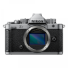 Nikon Zf mirrorless camera body seen from the front with lens mount exposed and textured black grip