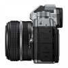 Side view of a camera with a large zoom lens attached; visible grip, dials, and side ports labeled HDMI and MIC/ microphone input area