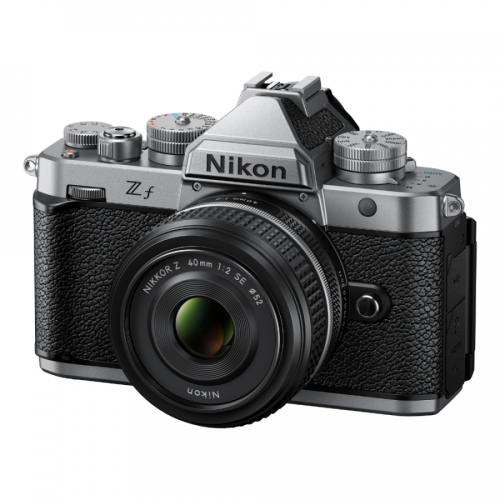 Nikon Z f mirrorless camera with a 40mm lens attached, silver top and black textured body.
