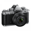 Nikon Zf mirrorless camera with a 40mm f/2 lens, silver and black body image on white background (product photo)