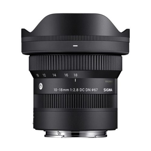 Sigma 10-18mm f/2.8 DC DN lens with hood mounted on the front element, black compact zoom lens for mirrorless cameras