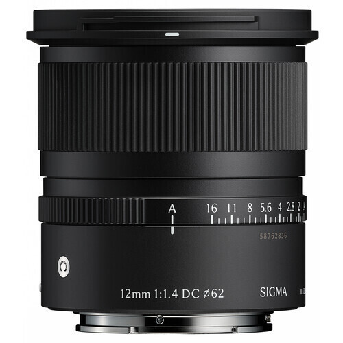 Sigma 12mm f/1.4 DC lens for cameras, shown in black with textured focus ring and white aperture markings; '12mm 1:1.4 DC Ø62' and 'SIGMA' visible on the barrel.