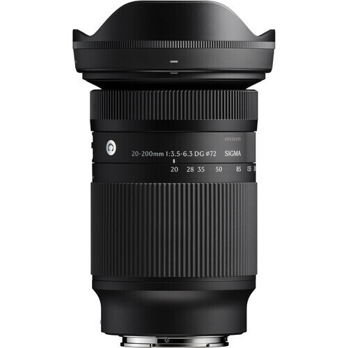 Sigma 20-200mm f/3.5-6.3 DG lens with lens hood mounted, photographed from the side against a white background