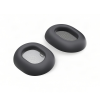 Pair of black oval headphone ear cushions with mesh inner lining, replacement padding for over-ear headphones