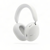 White over-ear headphones (Sonos) with padded ear cups and headband viewed from the side, isolated on a white background.