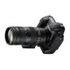 Nikon DSLR camera with a large zoom lens attached, shown in profile on a white background.