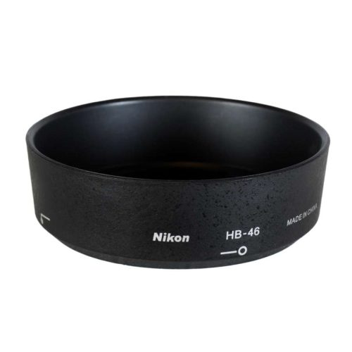 Black Nikon HB-46 lens hood, a cylindrical shade accessory for camera lenses with white branding on the side