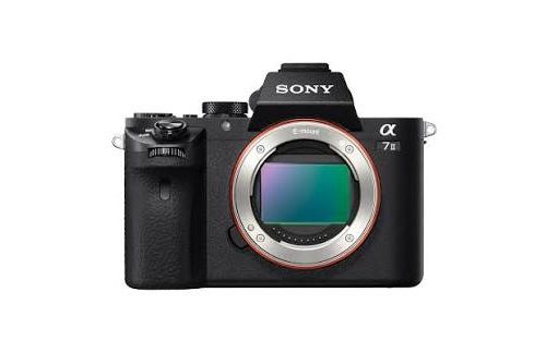 Front view of a black Sony Alpha mirrorless camera body with lens mount exposed and a red ring around the mount.
