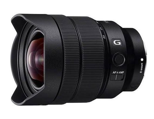 Black camera lens with lens hood and multiple rings, shown from the side (informational product image).