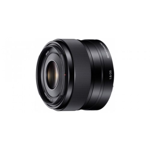 Close-up of a black camera lens on a white background.